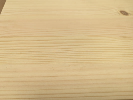 Close-up of a wooden surface with visible grain pattern