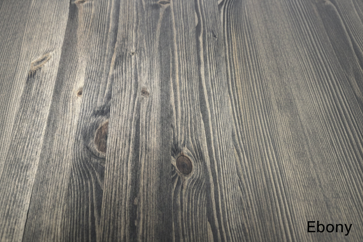 Close-up of an Ebony wooden surface with visible grain and texture